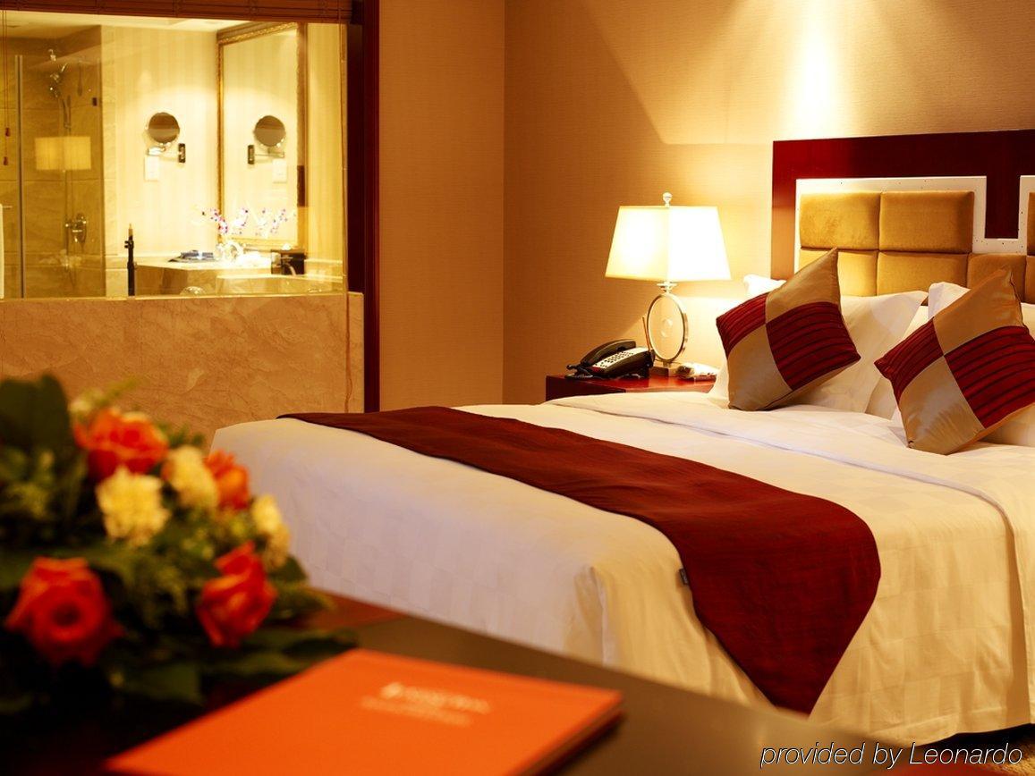 Shenyang Rich Gate Hotel Habitación foto